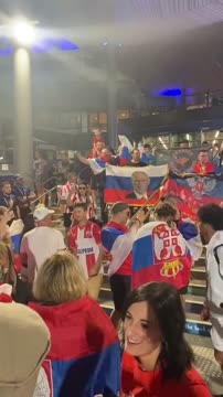 Фанаты развернули флаг России с изображением Владимира Путина